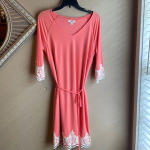 Coral knee length dress with lace trim